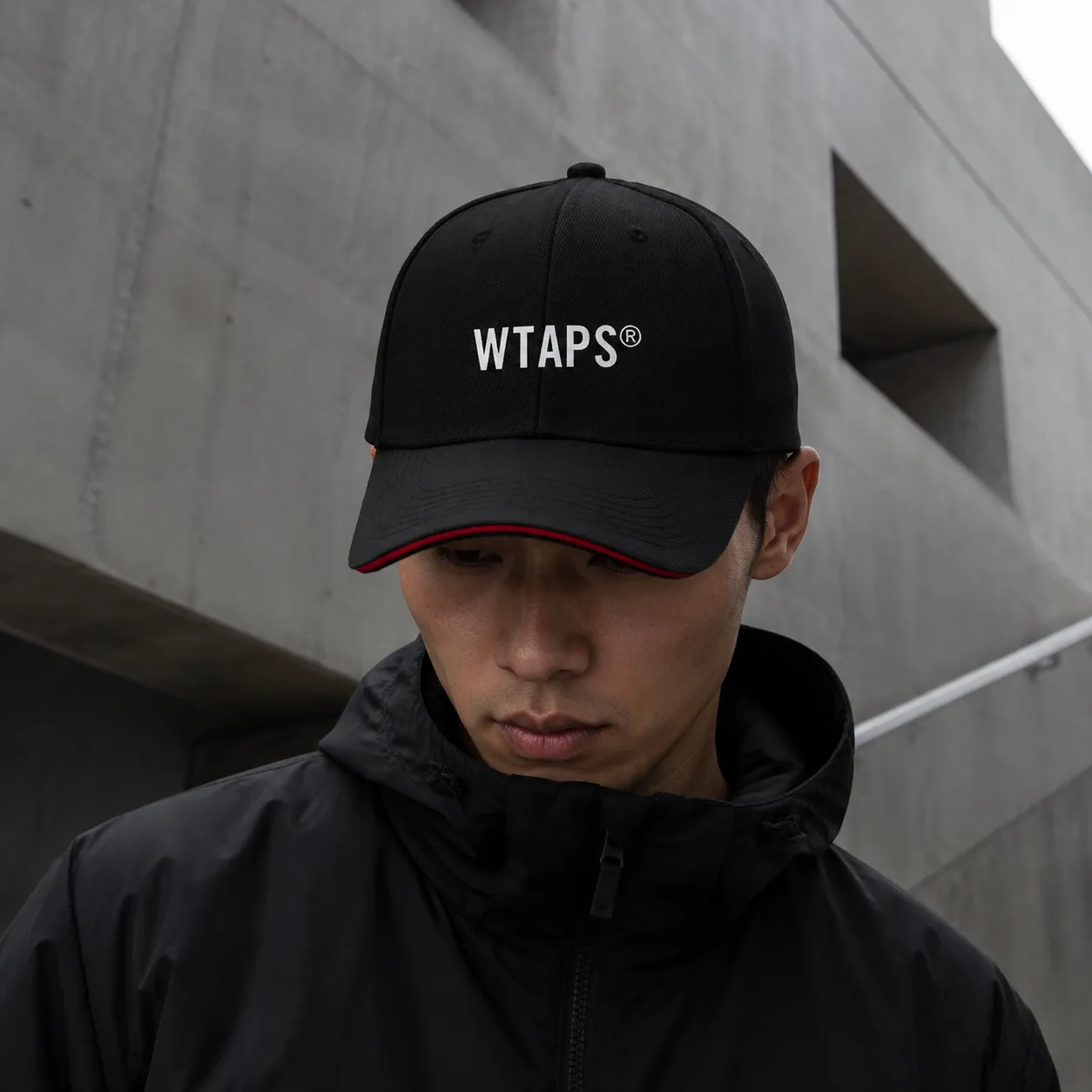 Model wearing WTAPS cap